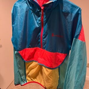Cotopaxi Kids Raincoat in Blue, Red, and Yellow